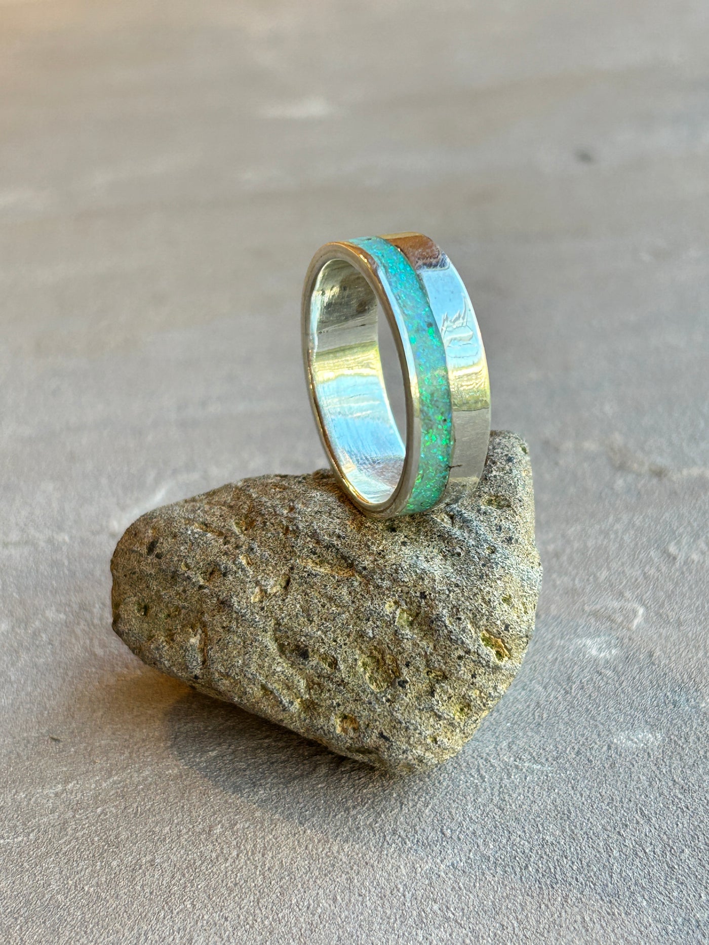 Crushed opal offset inlay band ring