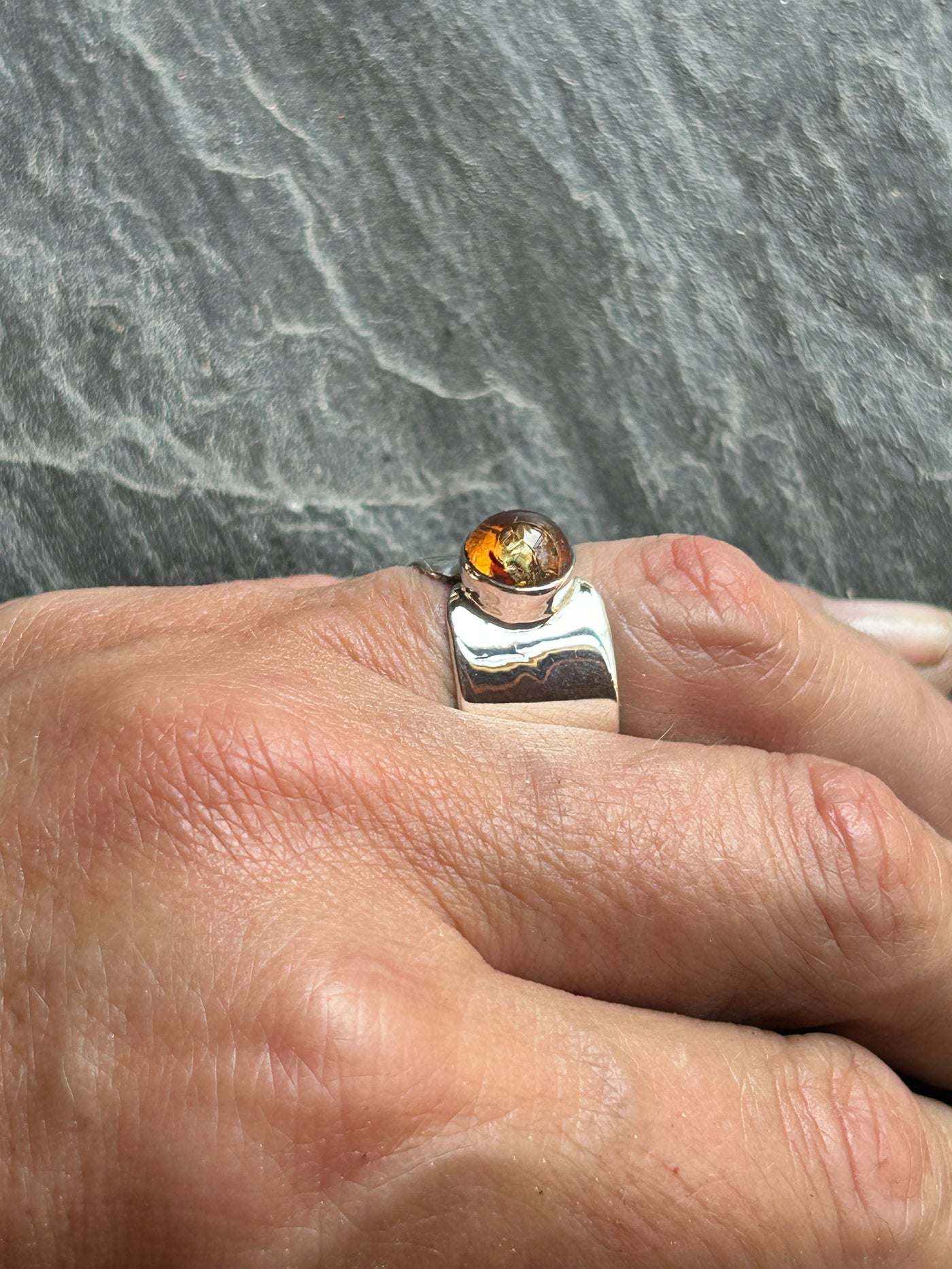 Wide ring with Amber cabochon