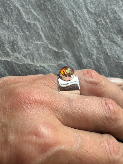 Wide ring with Amber cabochon