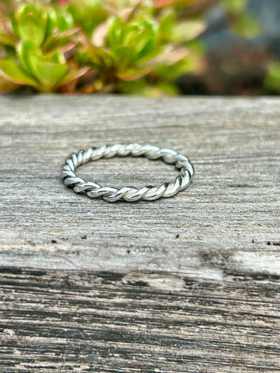 silver rope stacking ring shown outside