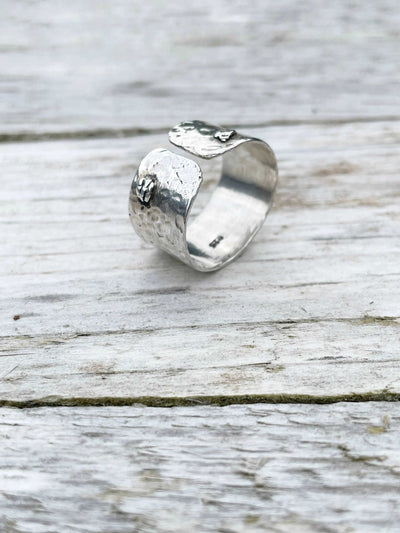 front detail of handmade Hammered Rivet Silver Ring with adjustable open-front design.