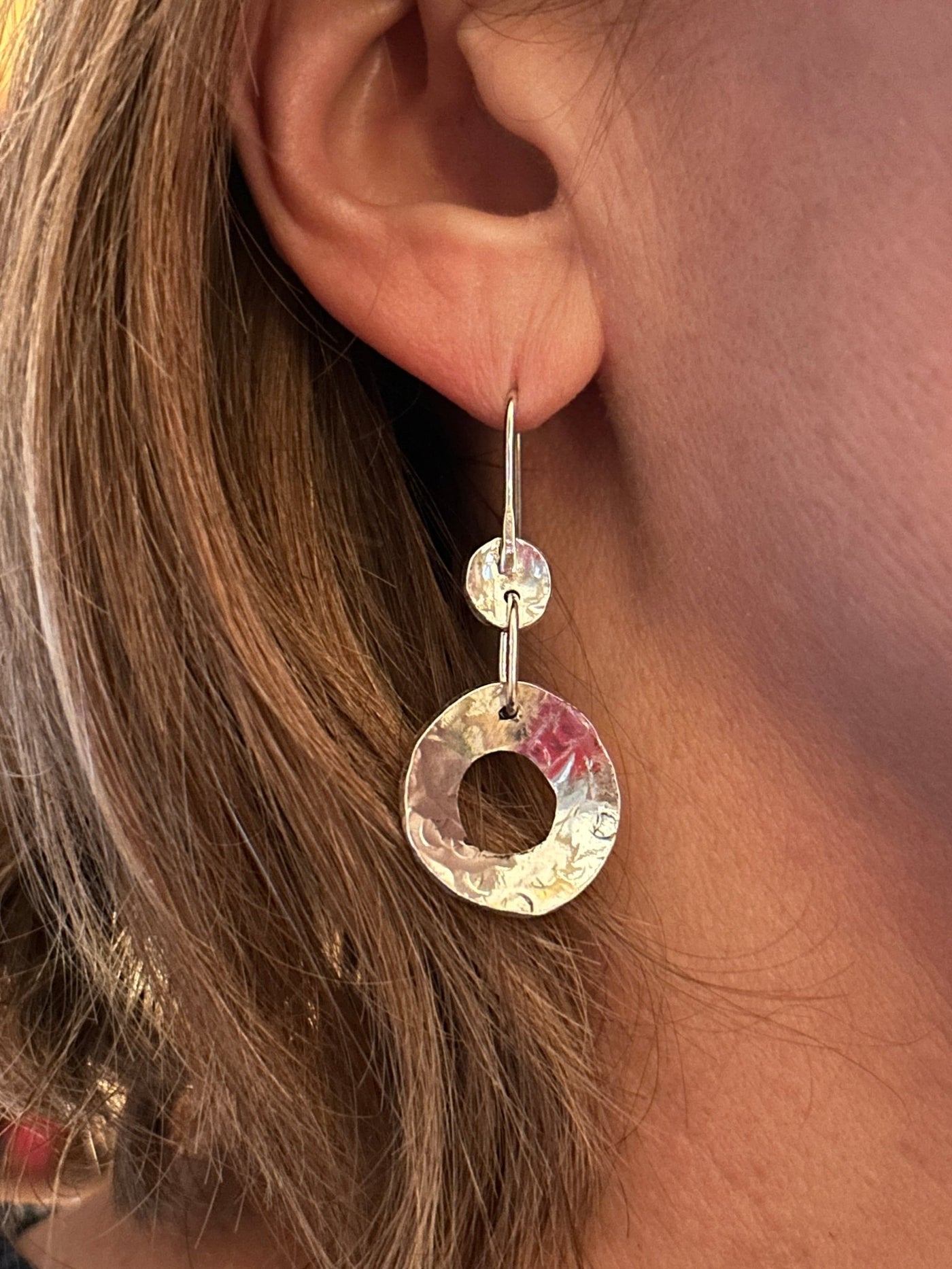 Sterling Silver Concave Earrings by LaVidaLoca Jewellery shown being worn