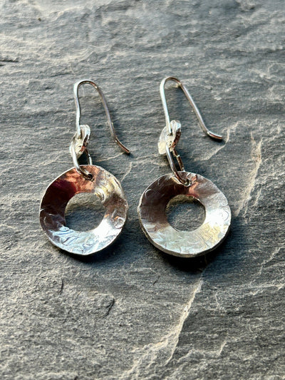 Sterling Silver Concave Earrings by LaVidaLoca Jewellery shown on a slate