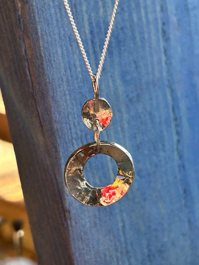 Sterling Silver Concave Pendant by LaVidaLoca Jewellery shown hanging