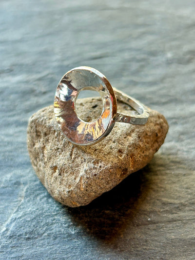 Sterling Silver Concave Ring by LaVidaLoca Jewellery shown on a stone