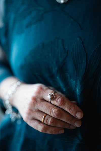 Sterling Silver Orbit Ring by LaVidaLoca Jewellery shown being worn on a hand