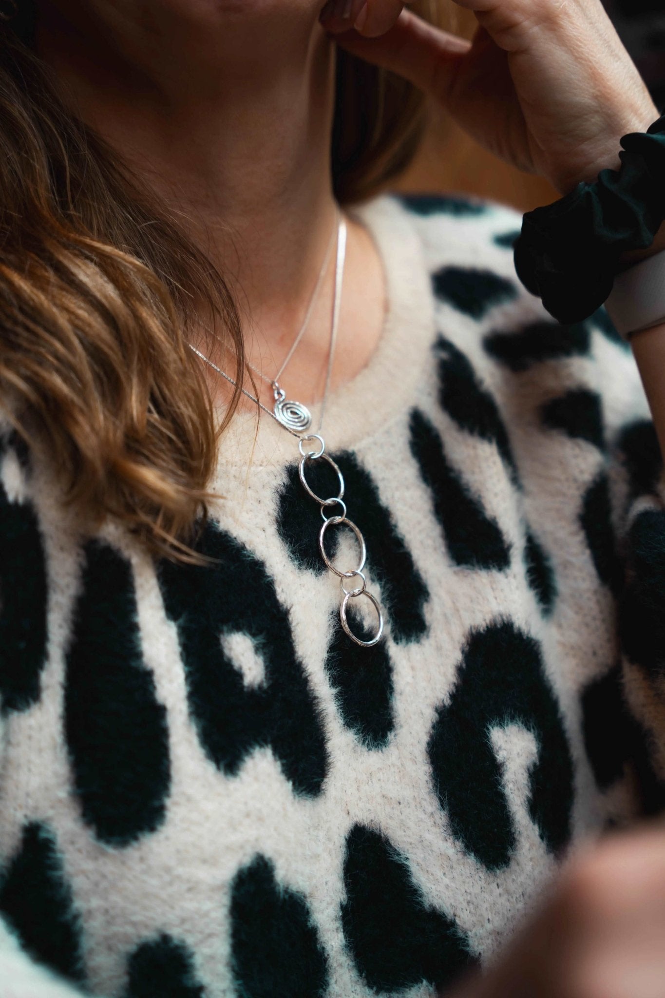 Small Spiral pendant shown being worn layered with a longer pendant
