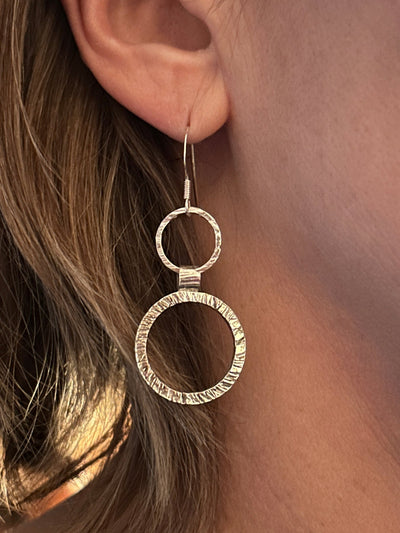 Sterling Silver Halo Earrings by LaVidaLoca Jewellery shown being worn