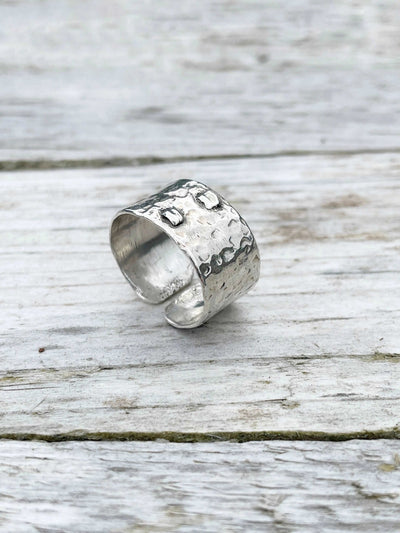 back detail of handmade Hammered Rivet Silver Ring with adjustable open-front design